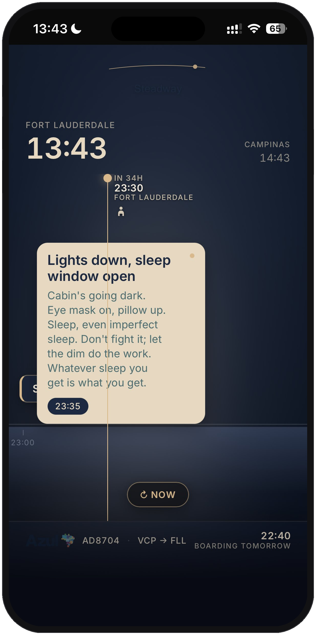Rec card mid-flight — lights down, sleep window open
